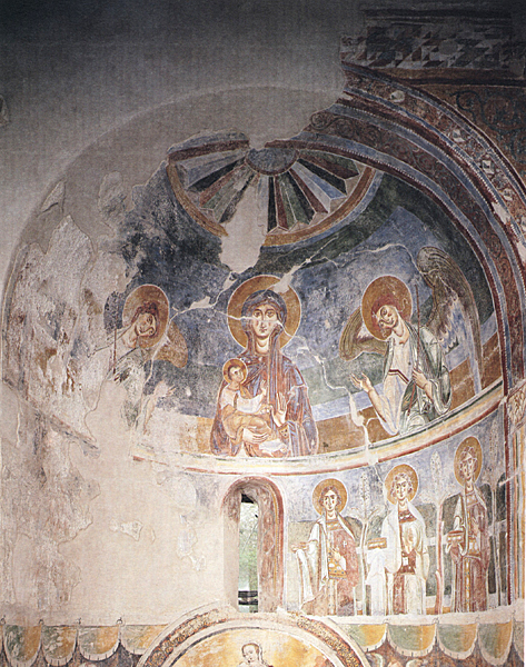 General view of apse with many figures painted in fresco, located at the east end of a church.