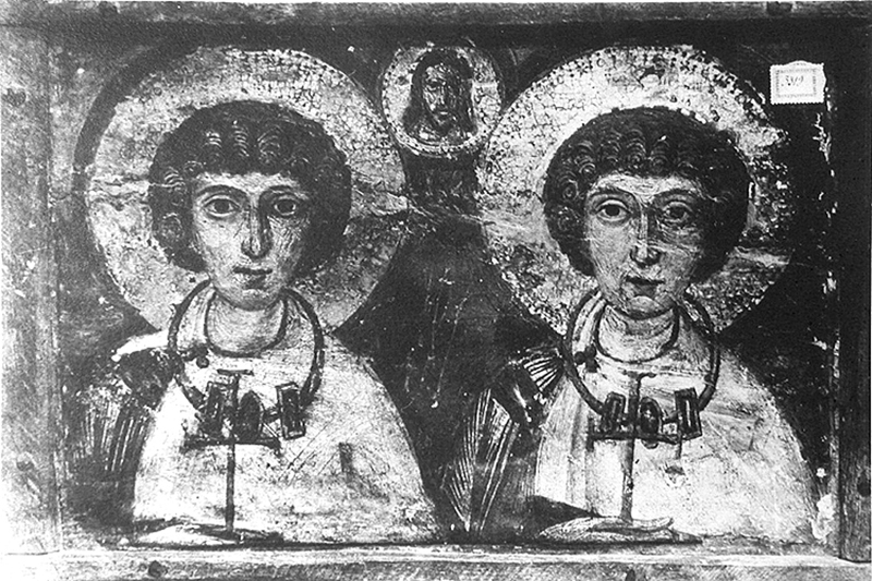 Panel painting with depiction of three male busts, all with haloes, two holding crosses.