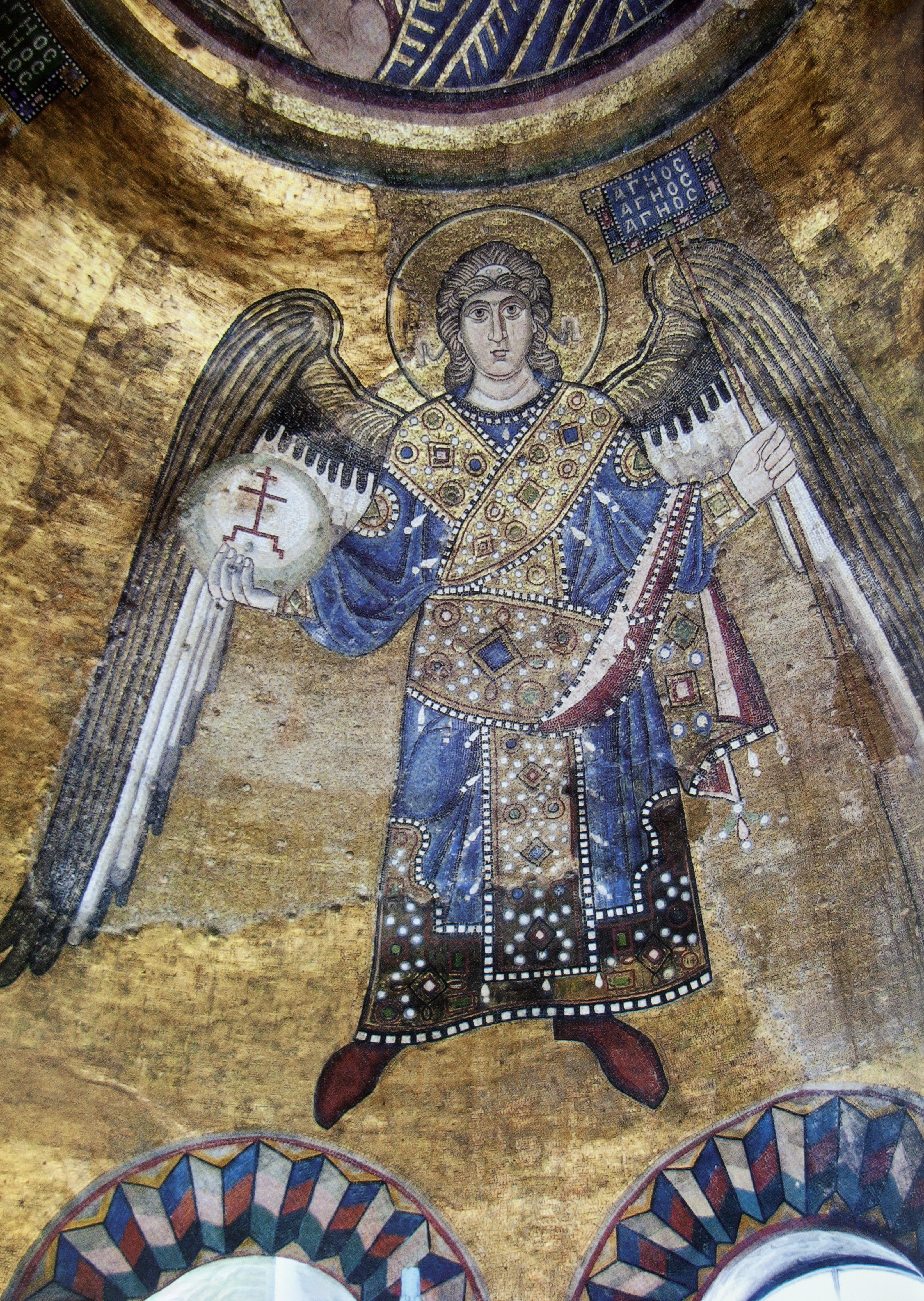 Mosaic of bust of male figure holding standard