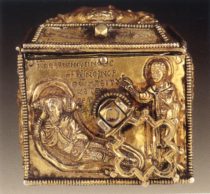 Silver-gilt pendant reliquary showing male figure raising his hand in blessing towards male figure lying on a sumptuous bed.