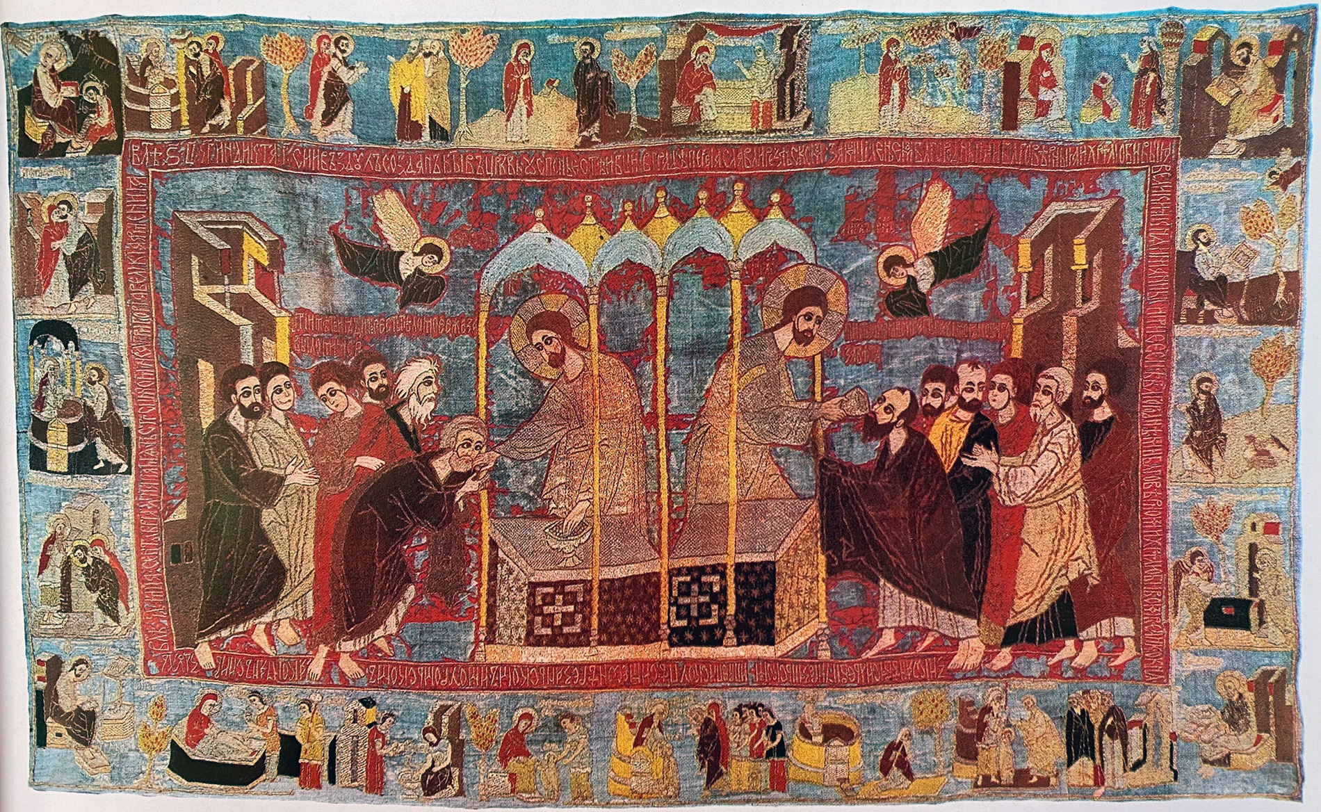 A veil embroidered with a scene of a man shown twice at an altar offering bread and wine to groups of other men surrounded by a border of smaller scenes.