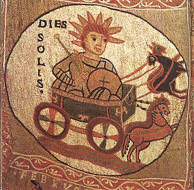 An embroidery with a roundel containing an image of the sun as a charioteer, wearing a crown of rays and carrying an orb and scepter, in a chariot drawn by four horses, beside the inscription "Dies Solis."