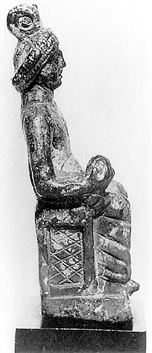 Right profile of a bronze statuette of a crowned male figure seated on a bench. He is holding a globe in his right hand and a shield in his left.