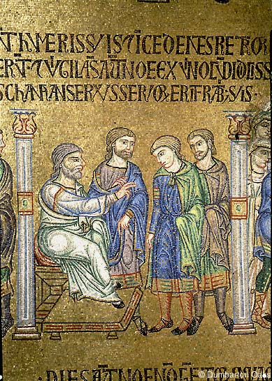 Mosaic detail depicting scene of four men, one bearded and sitting, gesturing toward two other men, between columns and surrounded above and below by Latin inscriptions; all against gold background.