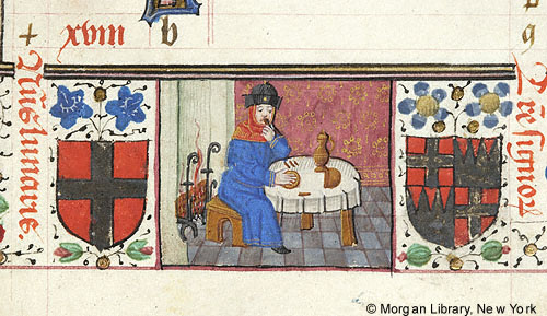 Flanked by plant forms and shields with heraldic imagery, a man sits by the fire at a table with food and drink.