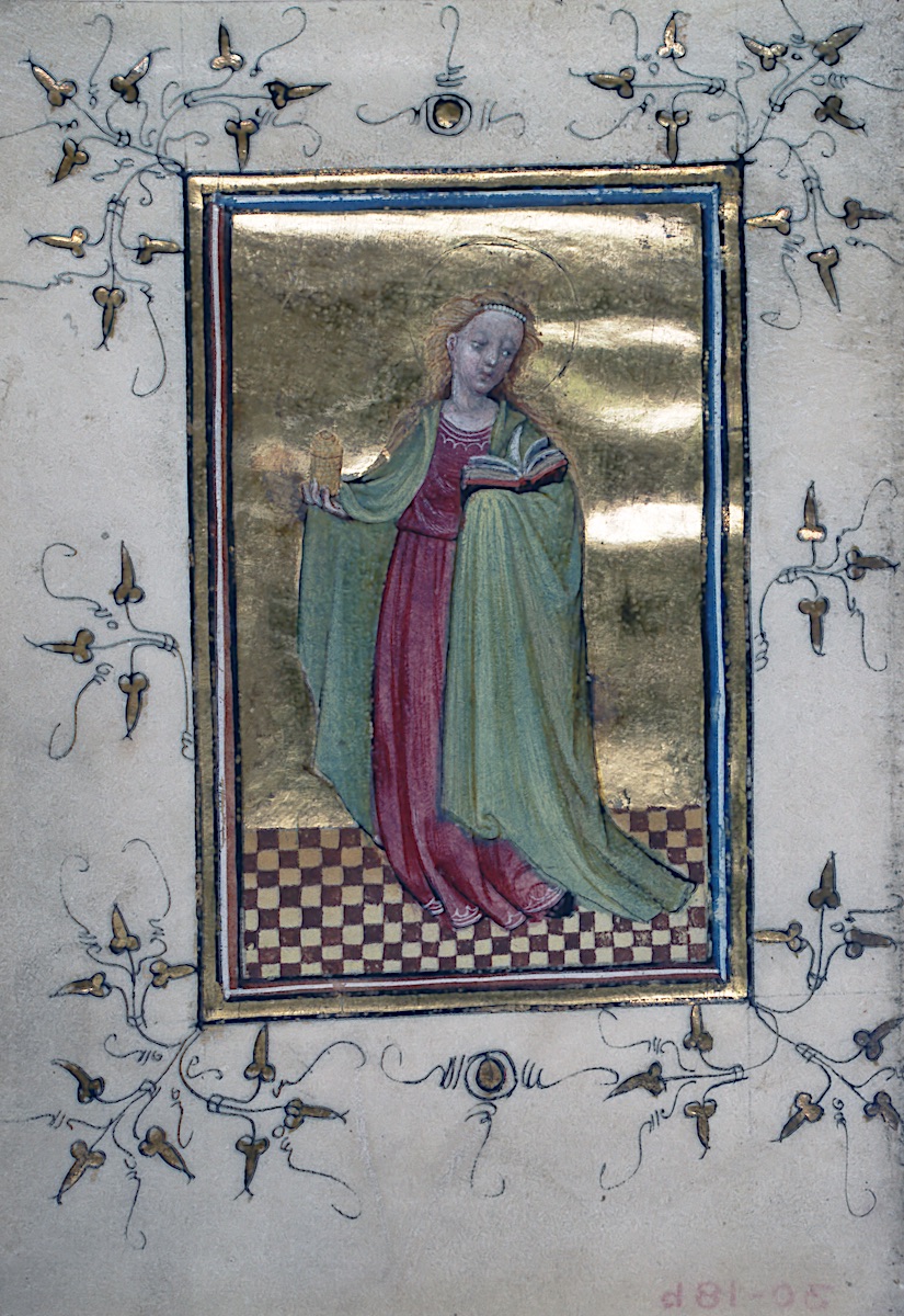 Manuscript page decorated with woman with blonde hair, wearing beaded or pearled headpiece at her hairline, halo around her head, draped with long green cloth over pink dress. In her left hand she is extending a small gold cylindrical jar, and with her draped right arm she supports an open book with fluttering pages, looking down and to her left, and standing in room with a red and white checkered floor. Gold background and marginal ornament of gold leaf spray patterns, balls, and penwork.
