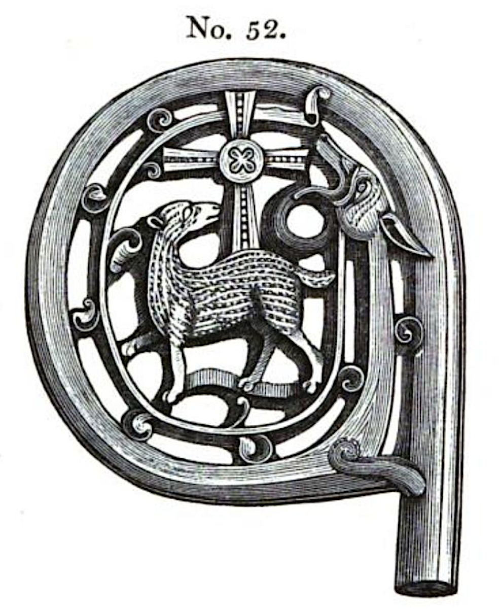 Black and white engraving of ivory crozier head enclosing a lamb, a cross, and the head of a serpent or dragon. Labeled figure number 52.